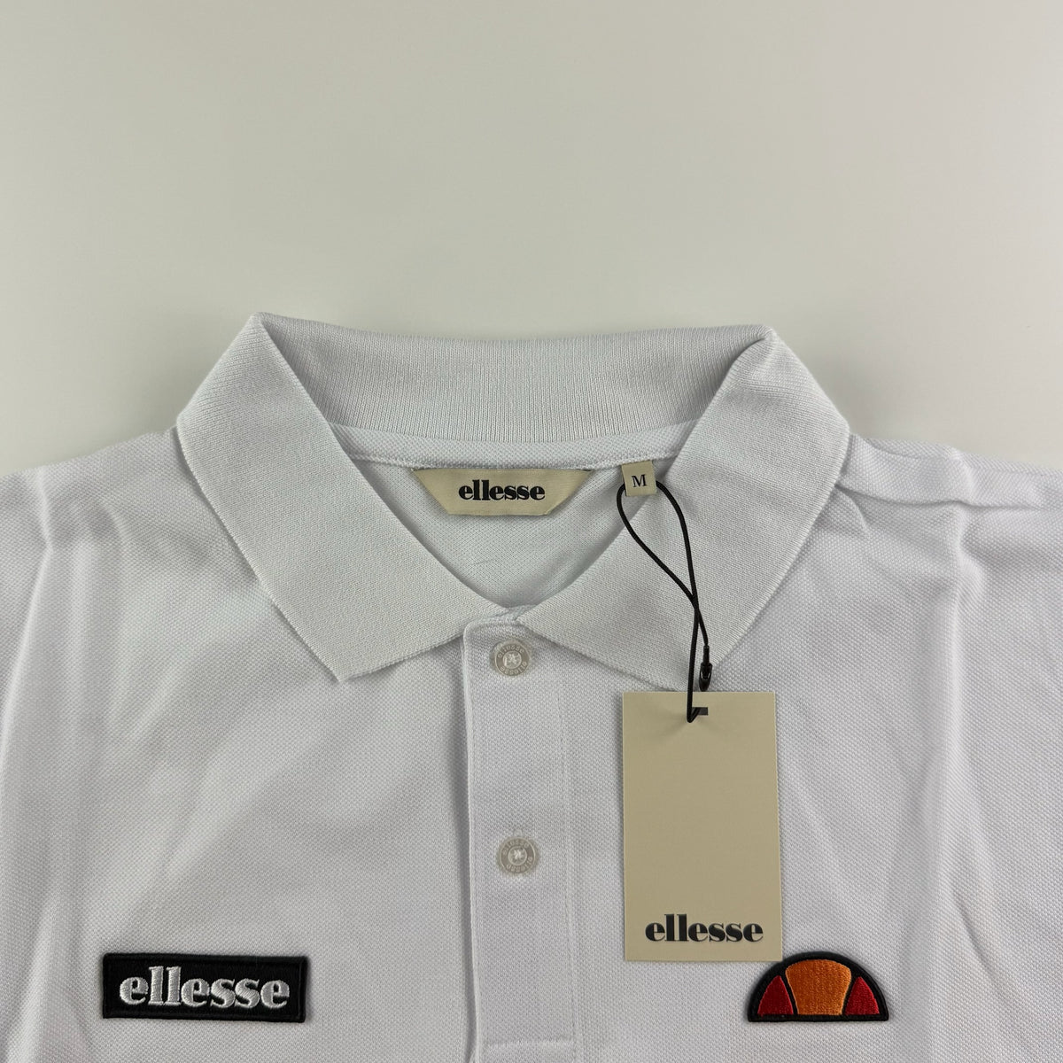 Ellesse Muccia Polo | Weiß / Schwarz